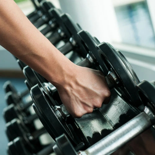 Pesas para gimnasios y revestimiento de mancuernas